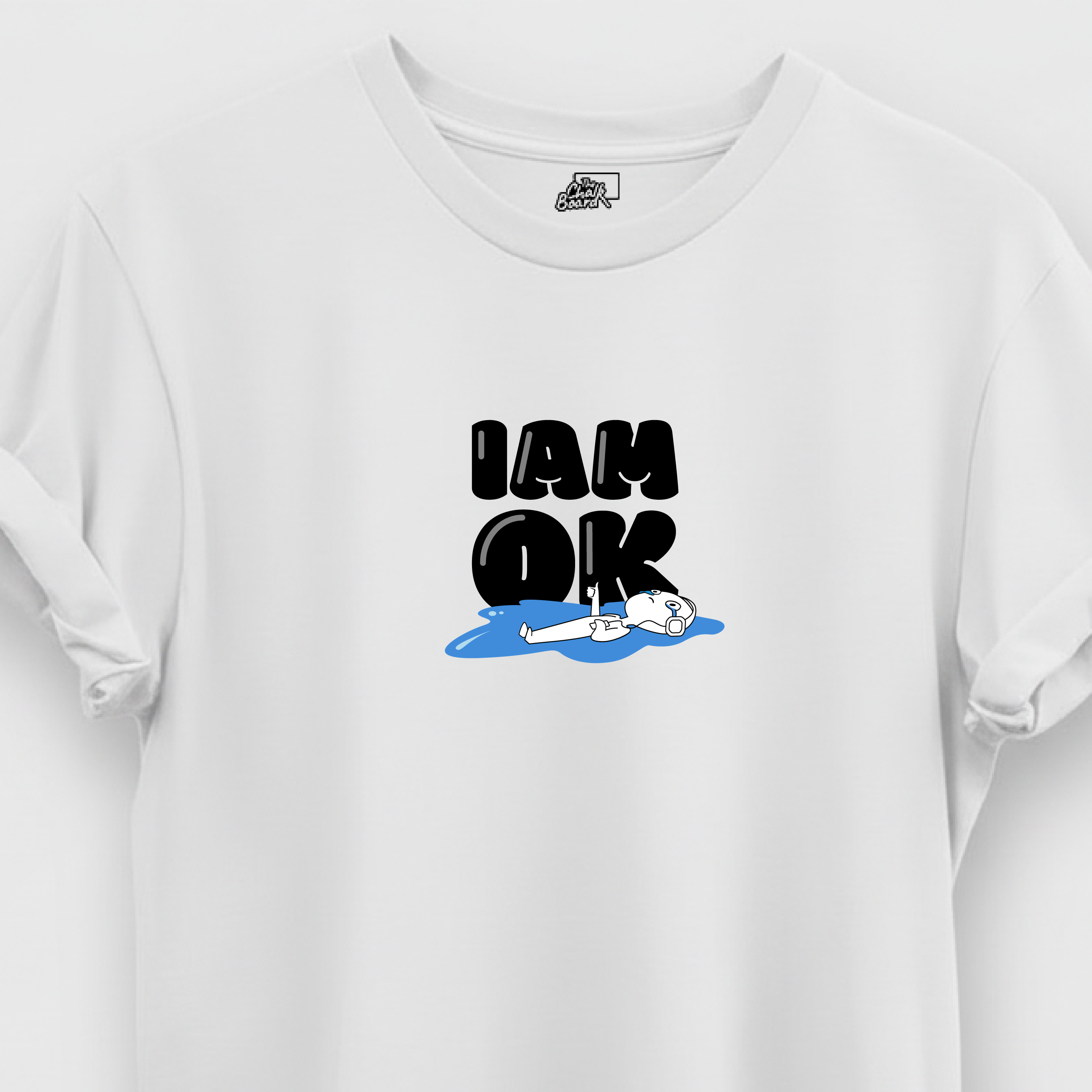 White t-shirt with 'I AM OK' graphic on a white background